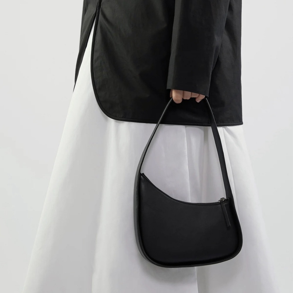 “Half moon” style black bag